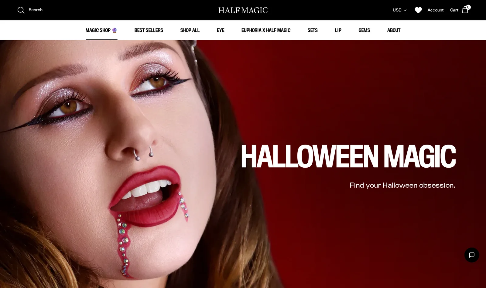 Half Magic Halloween collection hero with a model wearing a vampire look with gem drips from the lip, under the words Halloween Magic, Find your Halloween obsession